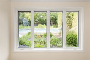 Casement windows overlooking pool
