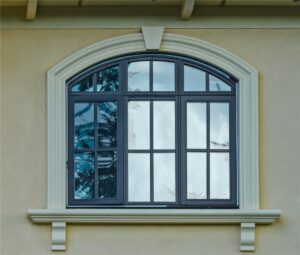 Black arched window on home