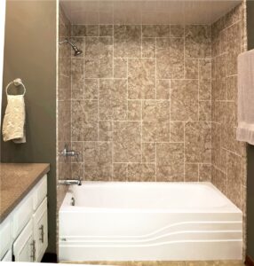 Brown title shower remodel