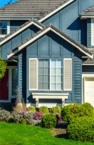 Sliding windows on a blue Florida home