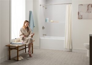 Woman getting ready in new remodeled bathroom