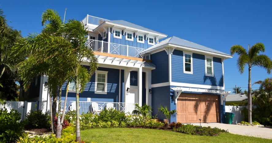 Bright blue home with energy efficient windows