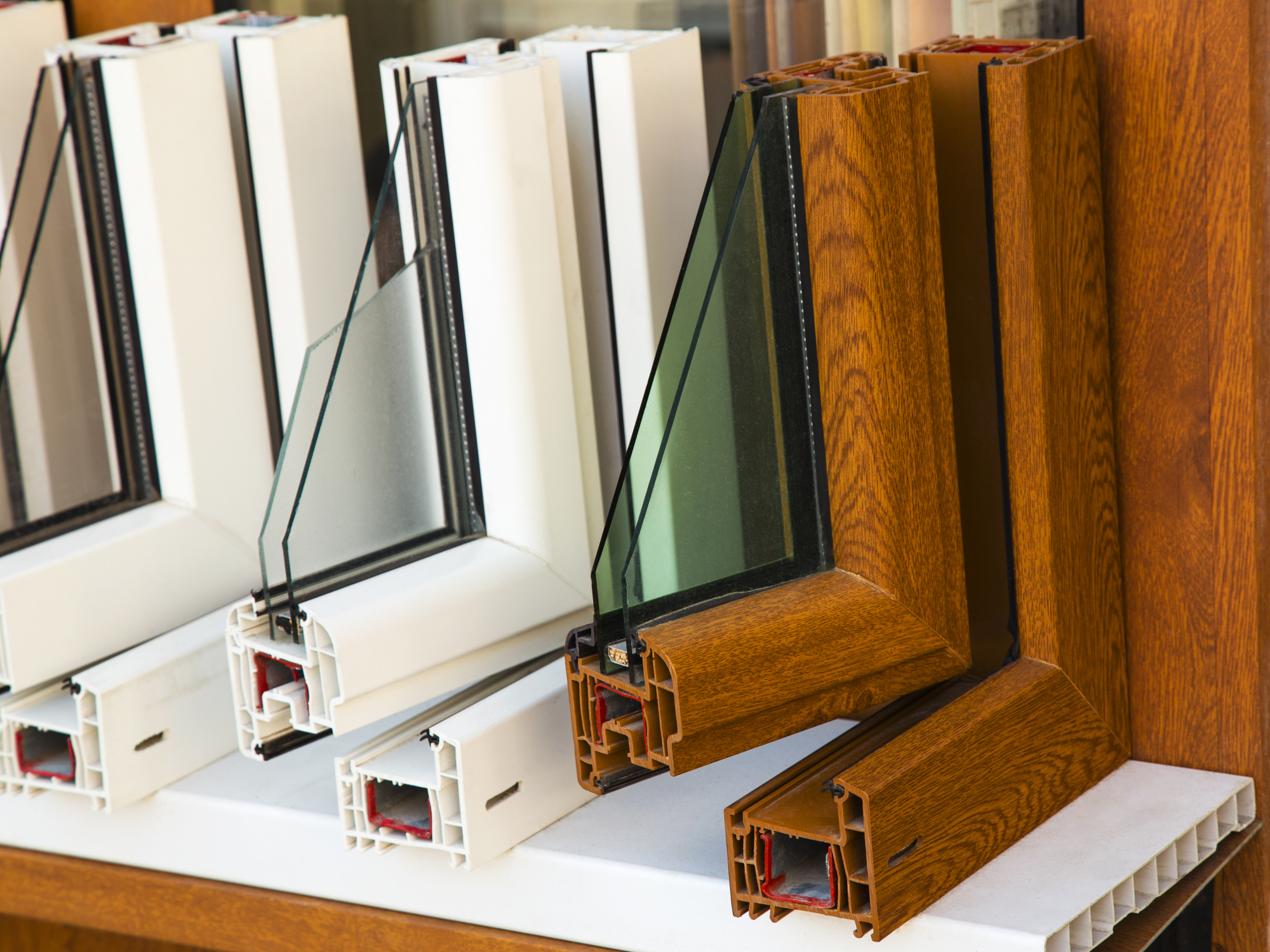 Cross-sections of different window materials, lined up for comparison.